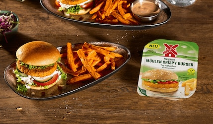 Rügenwalder Mühle Crispy Burger, daneben Burger mit Fries.png