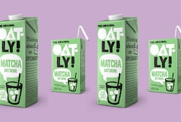vier Packungen Oatly Matcha Haferdrink, lila Hintergrund.png